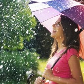 Icon happy woman with umbrella in the rain