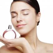 Icon 1441269101 woman smelling bottle of perfume