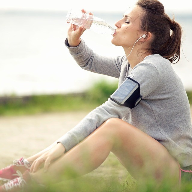 Woman drinking water 6 ways boost your metabolism