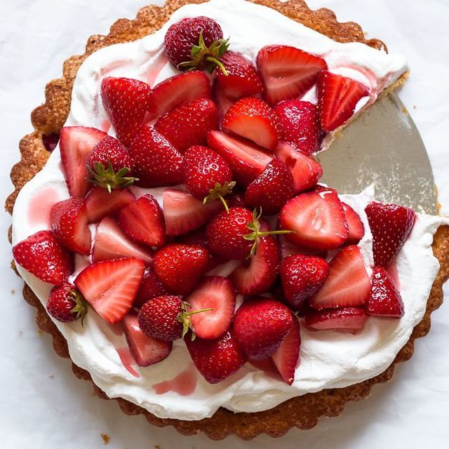 1496332847 fork knife swoon whole grain strawberry buttermilk cake macerated strawberries 1