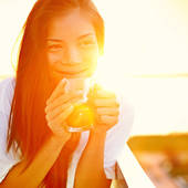 Icon 1451023116 bigstock asian woman drinking coffee in 48689936