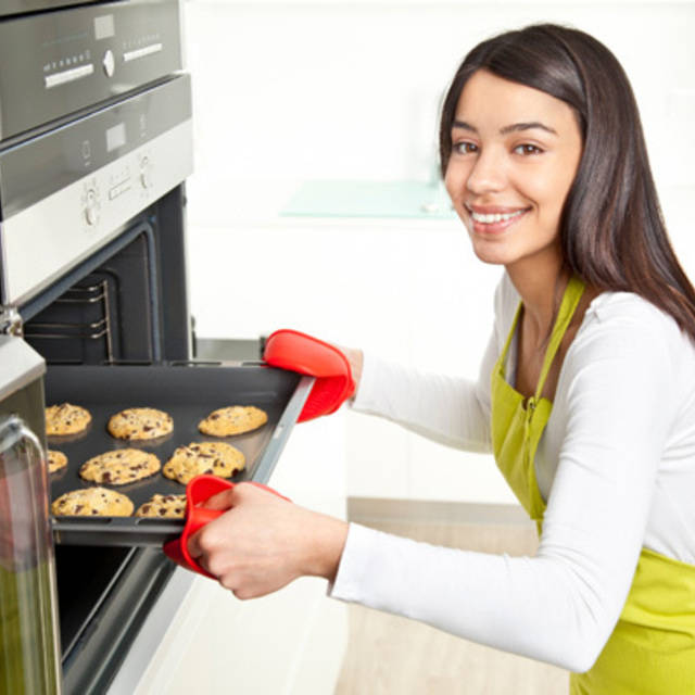 1454297605 woman baking cookies