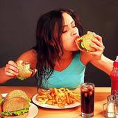Icon 1442200463 stock footage woman eating fast food time lapse1