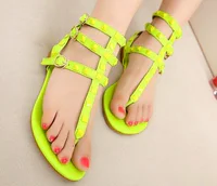 https://image.sistacafe.com/w200/images/uploads/content_image/image/159087/1468070881-2013-Fashion-rivets-flat-sandals-women-s-ankle-strap-gladiator-flip-flop-sandals-neon-color-yellow.jpg