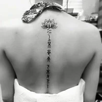 https://image.sistacafe.com/w200/images/uploads/content_image/image/164625/1469167791-Lotus-and-fonts-spine-tattoo-24.jpg