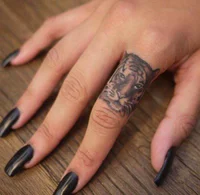 https://image.sistacafe.com/w200/images/uploads/content_image/image/199865/1472904453-4-tiger-finger-tattoo1.jpg