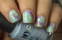 https://image.sistacafe.com/w200/images/uploads/content_image/image/204146/1473318708-Green-And-Purple-Galaxy-Nail-Art-For-Short-Nails.jpg