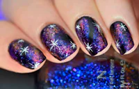 https://image.sistacafe.com/w200/images/uploads/content_image/image/204159/1473318877-Sparkle-Galaxy-Nail-Art-With-White-Stars-Design.jpg
