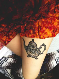 https://image.sistacafe.com/w200/images/uploads/content_image/image/222962/1475513191-Lovely-teapot-leg-tattoo.jpg