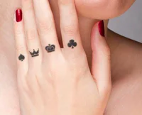https://image.sistacafe.com/w200/images/uploads/content_image/image/224311/1475654774-450-woman-with-poker-crown-tattoo.jpg