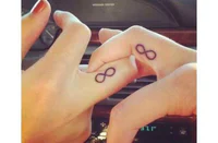 https://image.sistacafe.com/w200/images/uploads/content_image/image/250381/1479193027-infinity-tattoo-designs-on-fingers.jpg