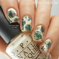 https://image.sistacafe.com/w200/images/uploads/content_image/image/285273/1484889823-Gold-Nails-with-Green-Flowers.jpg