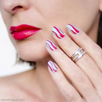 https://image.sistacafe.com/w200/images/uploads/content_image/image/303304/1487350962-bright-red-lipstick-looking-good-with-nail-art.jpg