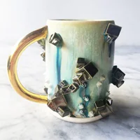 https://image.sistacafe.com/w200/images/uploads/content_image/image/347729/1493600880-crystal-coffee-cups-silver-lining-ceramics-katie-marks-3-5901d80dc13f7__700.jpg