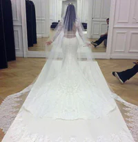 https://image.sistacafe.com/w200/images/uploads/content_image/image/348461/1493710446-Kim-Kardashians-Wedding-Dress-600x619.jpg