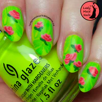 https://image.sistacafe.com/w200/images/uploads/content_image/image/37808/1442512665-Neon-Green-Nails-With-Cute-Roses.jpg