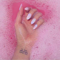 https://image.sistacafe.com/w200/images/uploads/content_image/image/380521/1497939541-Pastel-aesthetic-nails-with-wirst-tattoo.png