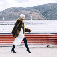https://image.sistacafe.com/w200/images/uploads/content_image/image/44708/1444393377-Your-White-Coordinates-Slouchy-Boots-Thick-Furry-Coat.jpg