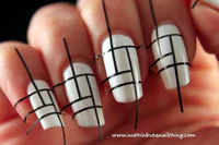 https://image.sistacafe.com/w200/images/uploads/content_image/image/48185/1445254235-White-and-Black-Line-Striped-Nail-Design-with-Tape.jpg