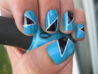 https://image.sistacafe.com/w200/images/uploads/content_image/image/80998/1452795588-nail-art-beautiful-blue-skies-nails-polish-design-with-cool-black-triangle-decoration-cool-nail-polish-design.jpg